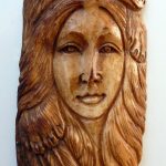 Bone Carving of Bear Woman Totem