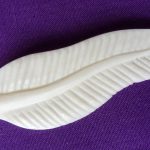 Bone carved feather